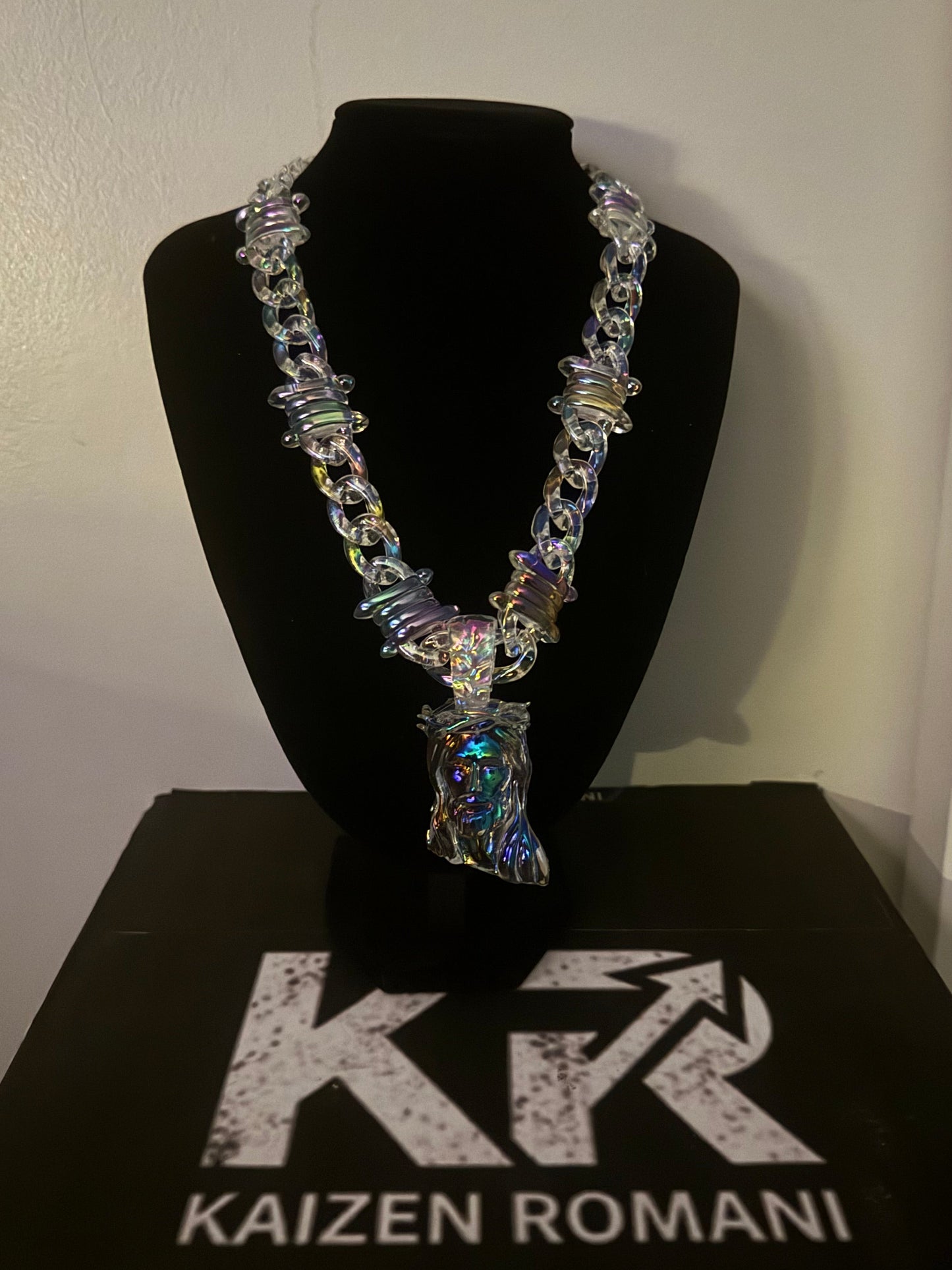 Cuban link chain with signature Jesus piece