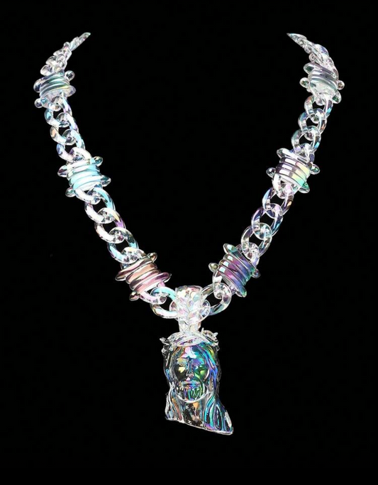 Cuban link chain with signature Jesus piece