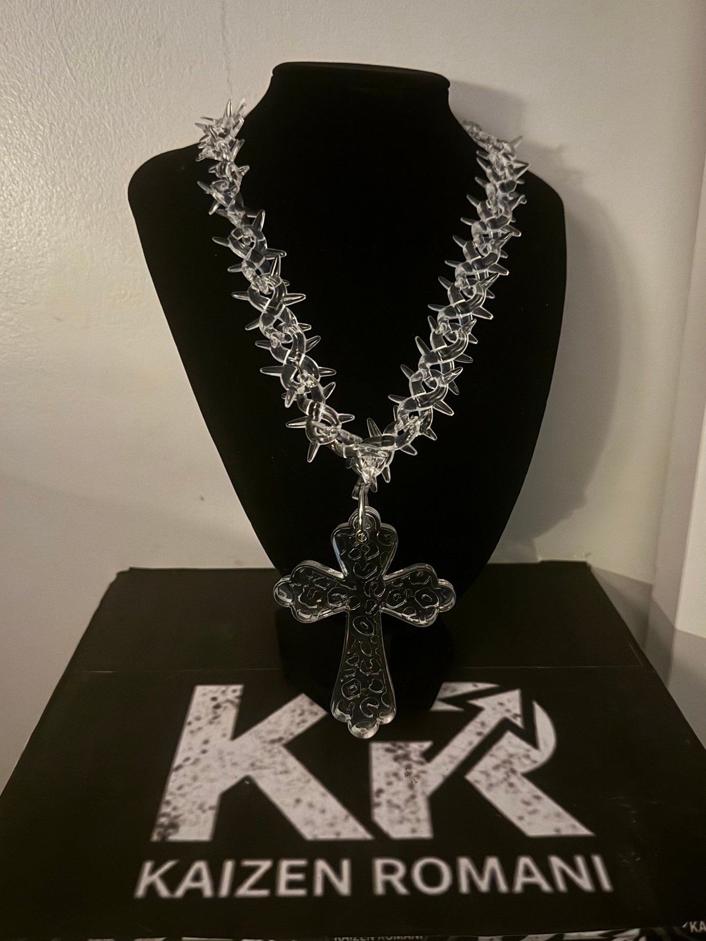 Barbed wire chain with a cross finish 