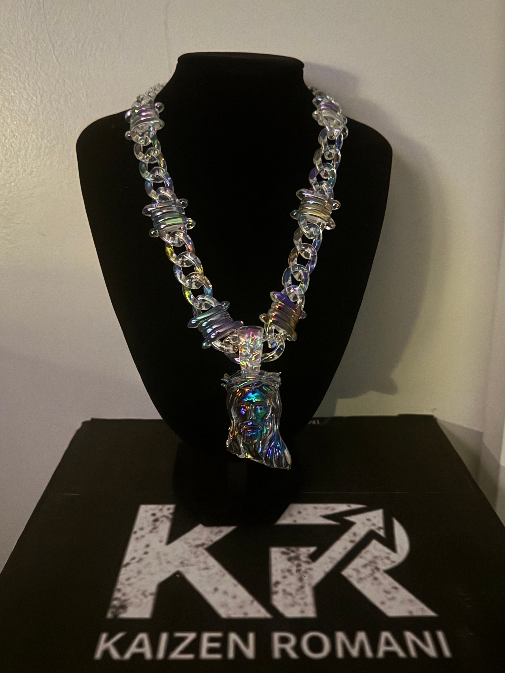 Cuban link chain with signature Jesus piece 